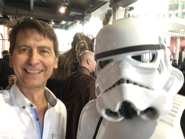Professor Chris Allton poses with a person wearing a Star Wars Stormtrooper outfit